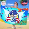Sonic the Hedgehog 35th Anniversary beach towel with blue winged character design and colorful geometric background shapes.!