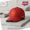 Spain National Football Team 2026 World Cup Champions baseball cap in red with yellow pinstripes and official team crest.