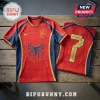 Spider-Man themed red and blue soccer jersey with Spanish national crest and number 7 on wooden surface.!