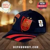 Spain National Team 2026 World Cup Champions baseball cap with red and gold crest, two stars, and FIFA trophy logo.