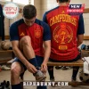 Spain National Team 2026 World Cup Champions football jersey featuring red and navy fabric with gold trophy graphic.