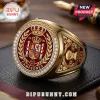 Spain National Team 2026 World Cup Gold Ring featuring a red crest, crown, and encrusted diamond trim on a leather surface.