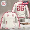 Spain National Team 2026 World Cup white varsity jacket featuring red striped sleeves, team crest, and Espana 26 back print.