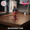 Spider-Man Brand New Day Beanie Sandwich Bobblehead featuring a stylized hero in a black hat sitting on a desk surface.