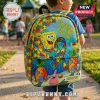 Child wearing a Spongebob Squarepants backpack with autism awareness puzzle piece patterns and the text Be Bright Be Kind.!