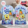 SpongeBob SquarePants Bikini Bottom T-shirt featuring SpongeBob, Patrick, Gary, pineapple house, and blue underwater decor.