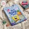 SpongeBob SquarePants Bikini Bottom T-Shirt in light blue featuring a cartoon pineapple house and floating bubbles.