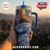 Star Trek 60th anniversary stainless steel tumbler with USS Enterprise NCC-1701 and crew against a rainbow space background.!