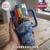 Star Trek 60th anniversary stainless steel tumbler with USS Enterprise NCC-1701 and crew against a rainbow nebula design.!