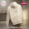 Star Wars 50th Anniversary Darth Vader Hoodie in beige with gold Millennium Falcon, moon texture, and quote on the back.