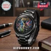 Star Wars 50th anniversary black stainless steel wristwatch featuring a character collage dial on a wooden desk.!