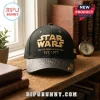 Star Wars Collector Edition Gold Logo Baseball Cap in black with embroidered text on a wooden shelf.
