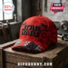 Star Wars Darth Vader Red Camo Embroidered Cap featuring black character stitching and Imperial symbols on a wood table.