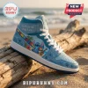 Light blue high-top sneaker featuring Stitch character, hibiscus flowers, puzzle piece ribbon, and Different, Not Less text.!