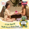 Crocheted green turtle plushie with a sunflower shell holding a card reading Positive Turtle You are turtle-y awesome.!