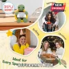 Crocheted green turtle plush holding a white sign with inspirational text on a desk near a rotary phone.!