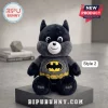 Superhero Bear Plush Doll in black and dark grey fabric with a yellow bat emblem chest logo and utility belt.