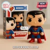 Superman DC Comics Vinyl Figure Display Plaque featuring a stylized figurine in a blue suit and red cape next to its box.