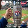 Texas Rangers metal tumbler with rhinestones, team logo, stadium relief, and straw held at a baseball game.!