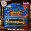 The Beatles Magical Mystery Tour 1967 AEC Reliance die-cast bus in blue and yellow packaging on a bookshelf background.