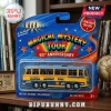 The Beatles Magical Mystery Tour 1967 AEC Reliance die-cast bus in blue and yellow packaging on a wooden surface.