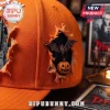 The Rolling Stones Halloween Orange Distressed Baseball Cap featuring a 3D bat and pumpkin patch on a frayed fabric edge.