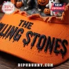 The Rolling Stones Halloween Orange Distressed Baseball Cap featuring black embroidered text with a dripping effect.