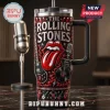 The Rolling Stones Stainless Steel 40oz Tumbler with red lips logo, electric guitar, and microphone graphics on black body.