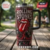 The Rolling Stones Stainless Steel 40oz Tumbler with red flame patterns, iconic tongue logo, and guitar illustrations.