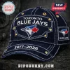 Navy blue denim Toronto Blue Jays baseball cap with gold rivets, embroidered team logo, and 1977-2026 text on the brim.!