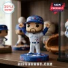 Toronto Blue Jays 2025 AL East Champions Advent Calendar vinyl figurine wearing a team jersey and cap on a round base.