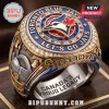 Toronto Blue Jays Engraved Championship Ring featuring team logo, crystals, and text on a gold and blue metal band.