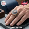 Toronto Blue Jays Engraved Championship Ring on a finger featuring the team logo, blue enamel, and gold-tone detailing.