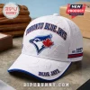 Toronto Blue Jays EST 1977 White Cap featuring embroidered team logo, red maple leaf, and embossed baseball motifs.