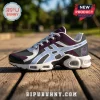 Toronto Tempo sneaker with deep purple and grey panels, white overlays, and air-cushioned white sole on wooden planks.!