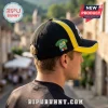 Black baseball cap featuring a Tour de France jersey patch, yellow side panel, and white piping on an outdoor background.!