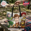 White leather-like tote bag featuring Woody, Buzz Lightyear, Jessie, Rex, and Slinky Dog with the name Emma printed.!