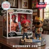 Tupac Shakur and Notorious B.I.G vinyl figures on a display base featuring LA and NYC motifs in front of original packaging.!