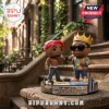 Tupac Shakur and Notorious B.I.G. vinyl figures on a display base featuring LA and NYC landmarks on a stone staircase.!