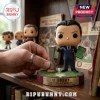 Unai Emery vinyl figure standing on an Aston Villa base with a trophy and tactics board, displayed on a wooden shelf.!