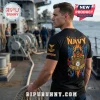 Man wearing black US Navy t-shirt with skull graphic, eagle, and anchor design on the back standing on ship deck.!