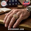 US Airborne Veteran commemorative gold-tone metal ring with American flag enamel details worn on a man's hand.!