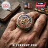 Gold-toned Airborne Veteran military ring with an eagle emblem, flag, red, white, and blue enamel on a person's finger.!