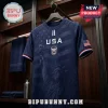 Navy blue USA soccer jersey featuring a Statue of Liberty graphic, eagle shield crest, and American flag sleeve patch.!