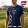 Navy blue soccer jersey with Statue of Liberty graphic, USA text, and American flag sleeve patch on a male model.!
