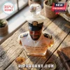 Victor Willis bust-shaped glass whiskey decanter with navy uniform, diamond-shaped stopper, on a wooden surface.!