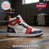 Custom high-top basketball sneaker in white, red, and blue with Air Jordan branding and Mystics graphic on wooden court.!