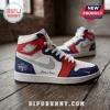 Custom high-top basketball sneakers with white, red, and blue leather, silver swooshes, and Mystics branding on wood floor.!