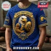 Blue West Coast Eagles t-shirt with gold eagle mascot holding a football, 1986 detailing, and embossed floral patterns.!
