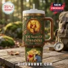 Winnie the Pooh 100 Years of Friendship 40oz tumbler with wood grain handle, circular character portrait, and text.